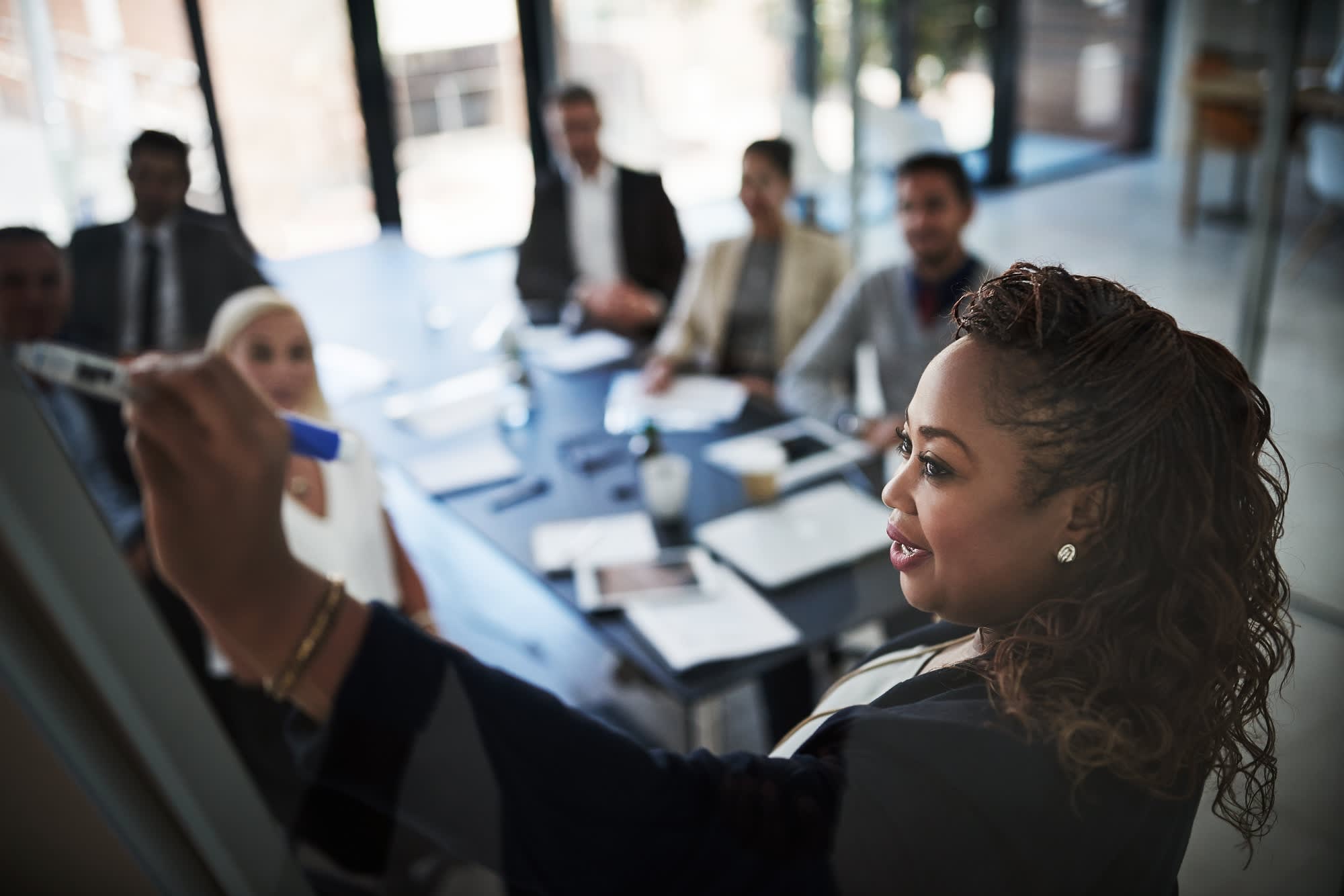 Black woman pitching to investors
